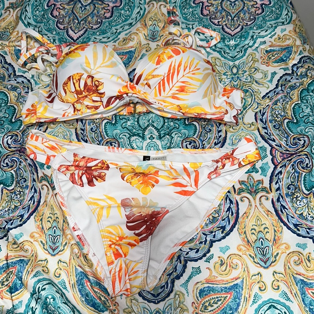 Brand Tahiti, size large, only been worn once